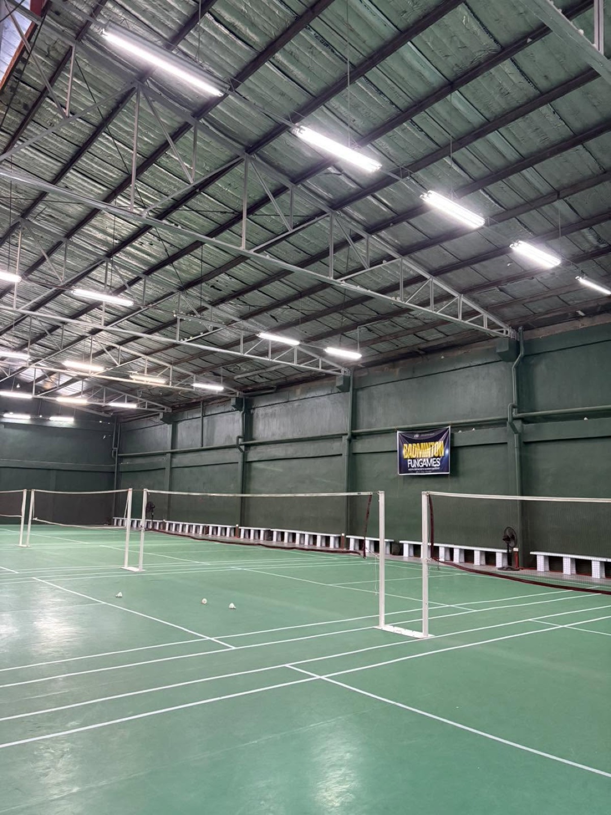 Indoor badminton courts at Hoops & Racket